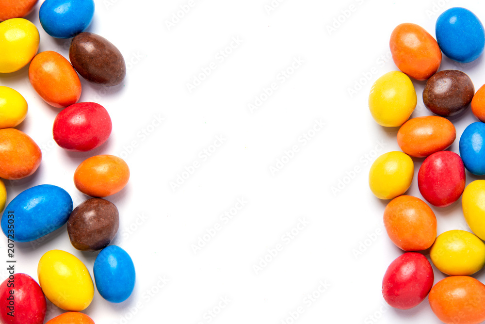 Sweet candy pills frame with copy space on a white background Sweet candy pills frame with copy space on a white background