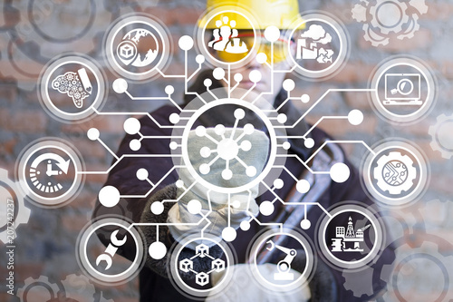 Hub Network Connection Industry 4.0. Industrial engineer clicks a atom structure icon surrounded by specific circuit components. Cyber Manufacturing Networking Digital System. photo