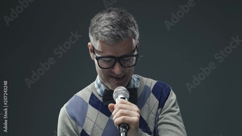 Nervous nerd man having performance anxiety photo