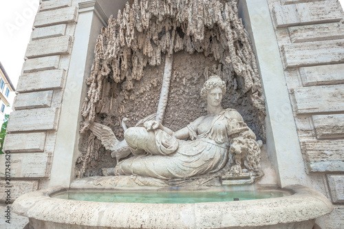 Renaissance fountain statue representing Juno goddess of marriage, pregnancy and childbirth, protector of the State, symbol of loyalty. in Rome, Italy. By D. Fontana and P. Berrettini photo