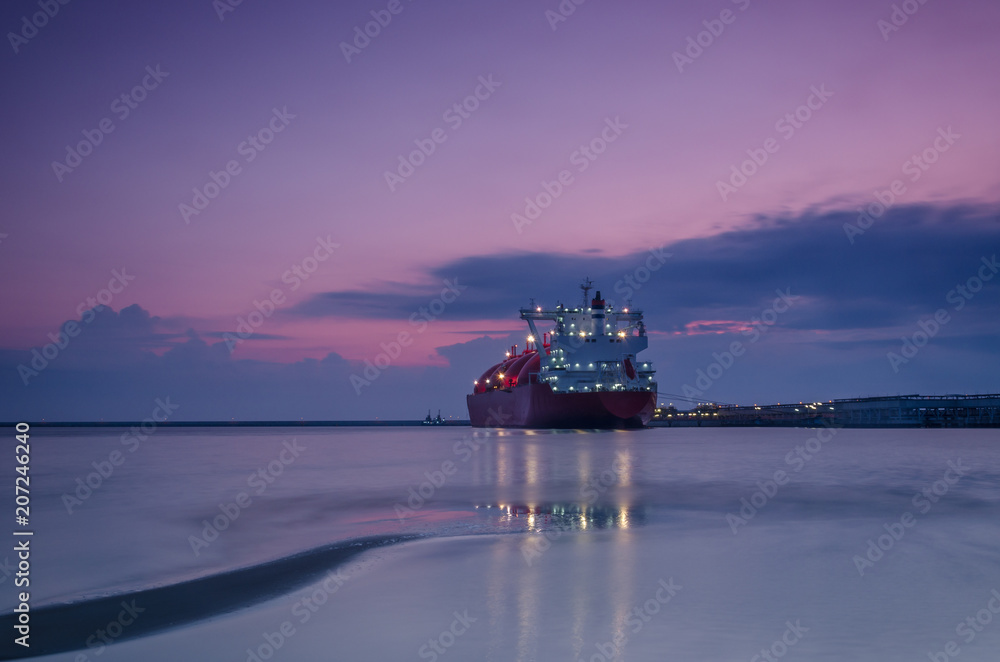 LNG TANKER - Sunrise at the gas terminal and tanker in Swinoujscie
