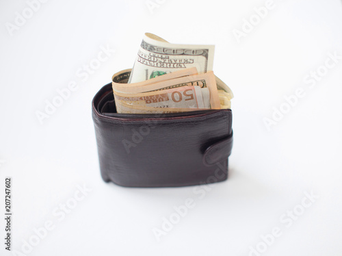 Stylish men's purse with money on white background