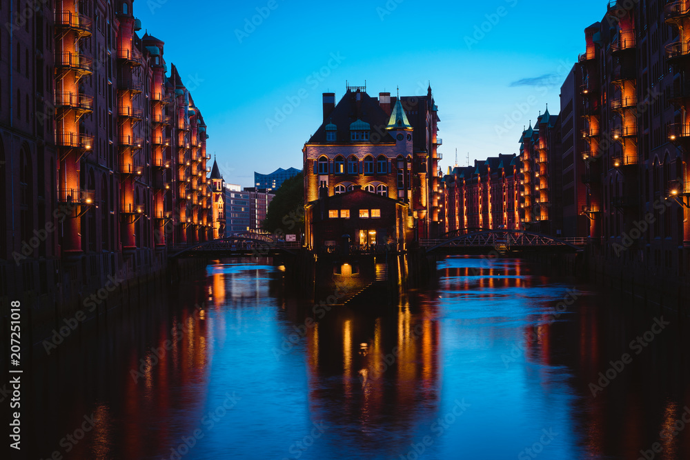 Water castle in old Speicherstadt or Warehouse district, Hamburg, Germany Water castle in old Speicherstadt or Warehouse district, Hamburg, Germany