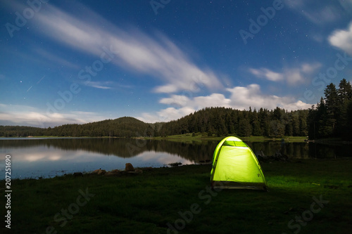 Tent under the stars on the dam Shiroka Poliana in Rodopi mountain, Bulgaria
