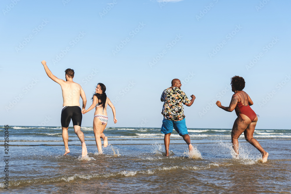 Diverse friends having fun at the beach Diverse friends having fun at the beach