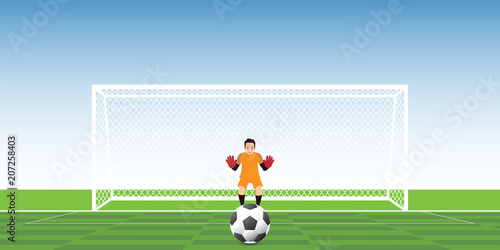 Goalkeeper ready to catch soccer ball at penalty kick on the gate.