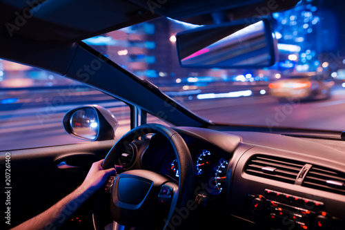 Car speed drive on the road in night city © Ivan Kurmyshov