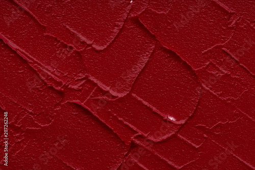 Red matte texture of lip gloss background