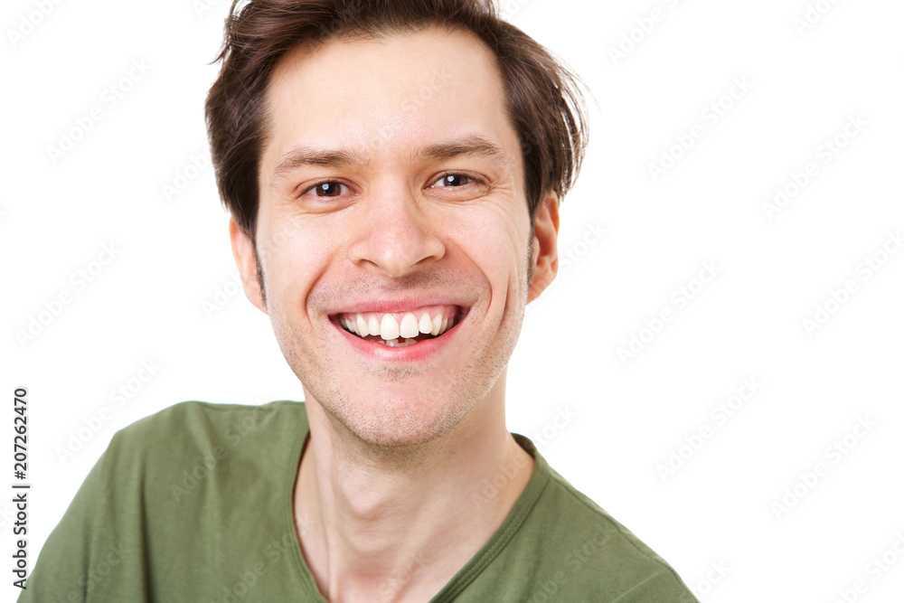 Close up casual man standing and smiling on white background Close up casual man standing and smiling on white background