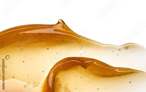 Golden smears of face cream or honey
