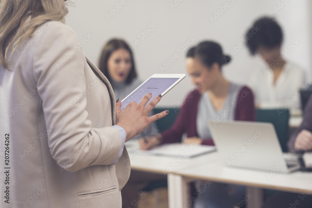 Businesswoman Presenting in Front of Audience Businesswoman Presenting in Front of Audience