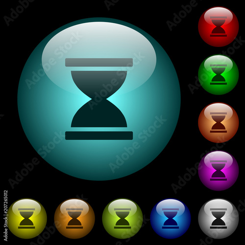 Hourglass icons in color illuminated glass buttons