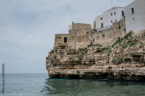 Old vintage houses on the rocks of the coast in Polignano a Mare apulia Italy