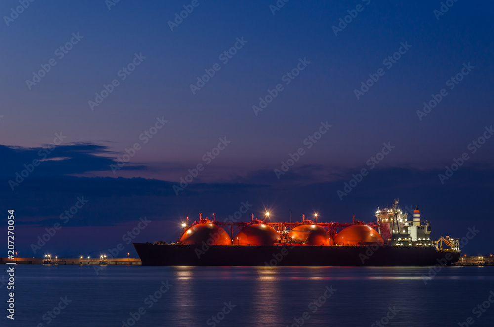 Fototapeta premium LNG TANKER - Sunrise at the gas terminal and tanker in Swinoujscie