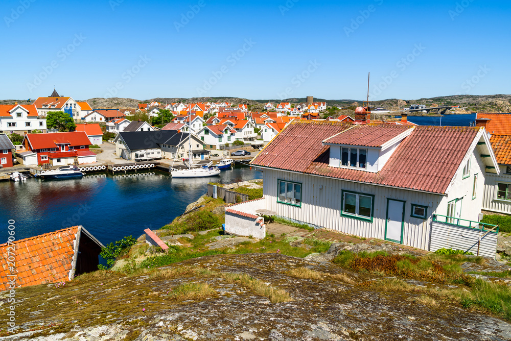 View over the coastal village of Kladesholmen outside the island Tjorn on the Swedish west coast. A warm and sunny day by the sea.