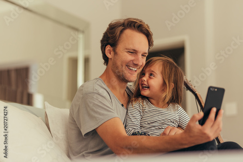 Father and daughter spending time together at home