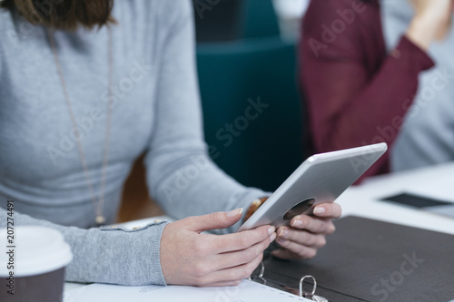 Woman Holding Tablet 
