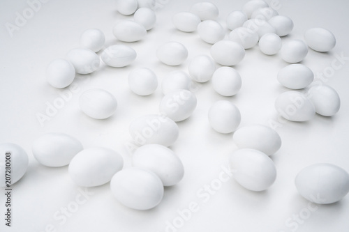White medical pills isolated on white background