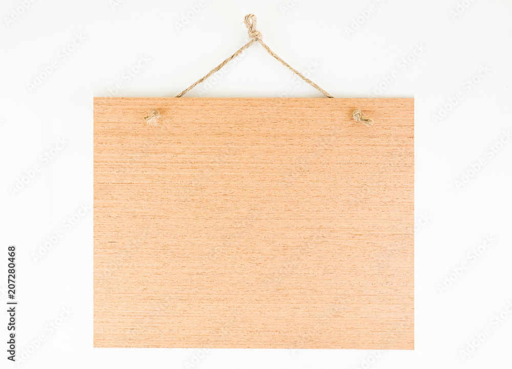 Labels made of natural wood, with a rope hanging on a white background, are empty. Labels made of natural wood, with a rope hanging on a white background, are empty.