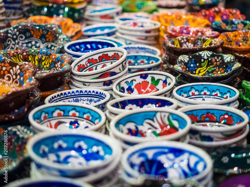 Handmade colorful Turkish ceramic plates on market.