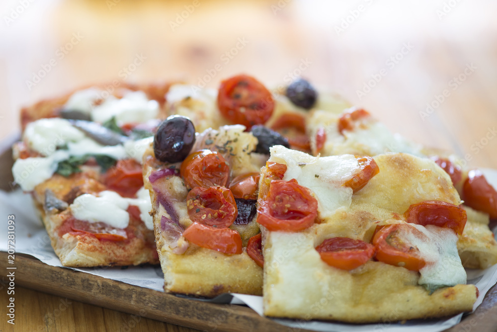 Pizza by the slice: the traditional roman way to eat street pizza in Rome Pizza by the slice: the traditional roman way to eat street pizza in Rome