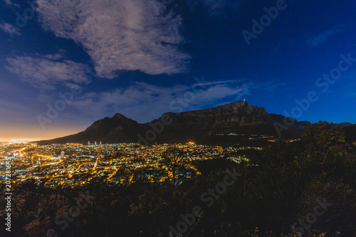 Table Mountain and Cape Town City Bowl at night with clouds