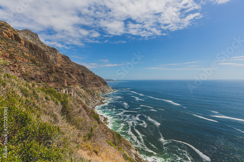 Chapman's Peak Drive along rocky coastal landscape in Cape Town