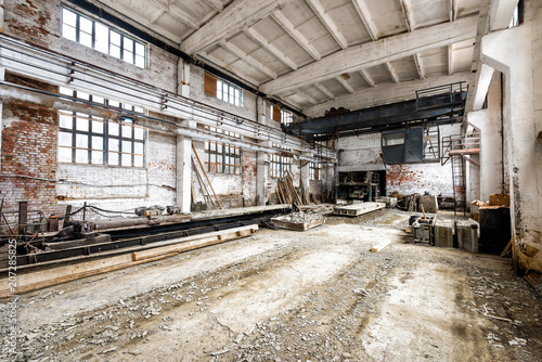 Shop pouring reinforced concrete slabs in the workshop of the shop of the obsolete Soviet factory