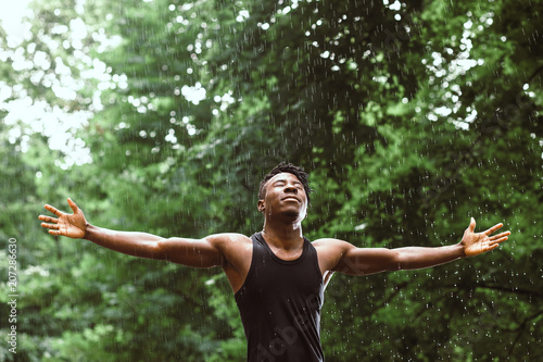 black man in the rain