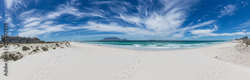 Panorama of Table Mountain from Blouberg with blue sky