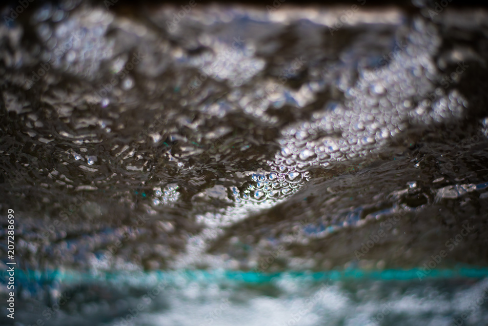 Abstract of bubbling water in a fountain Abstract of bubbling water in a fountain