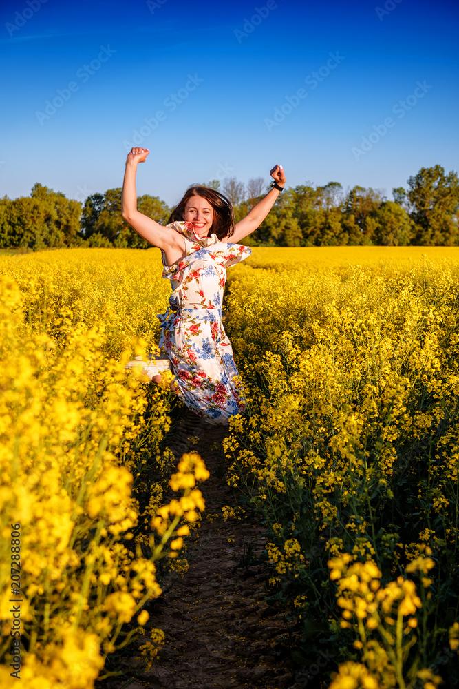 jumping girl in rape field jumping girl in rape field
