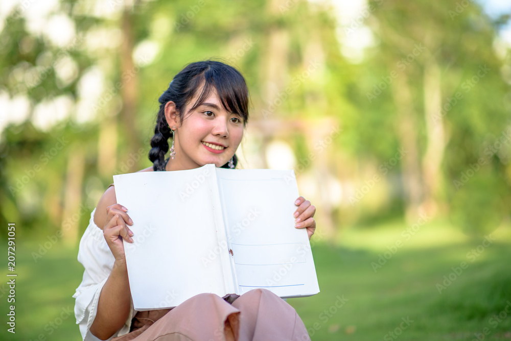 Asian women with a book Asian women with a book