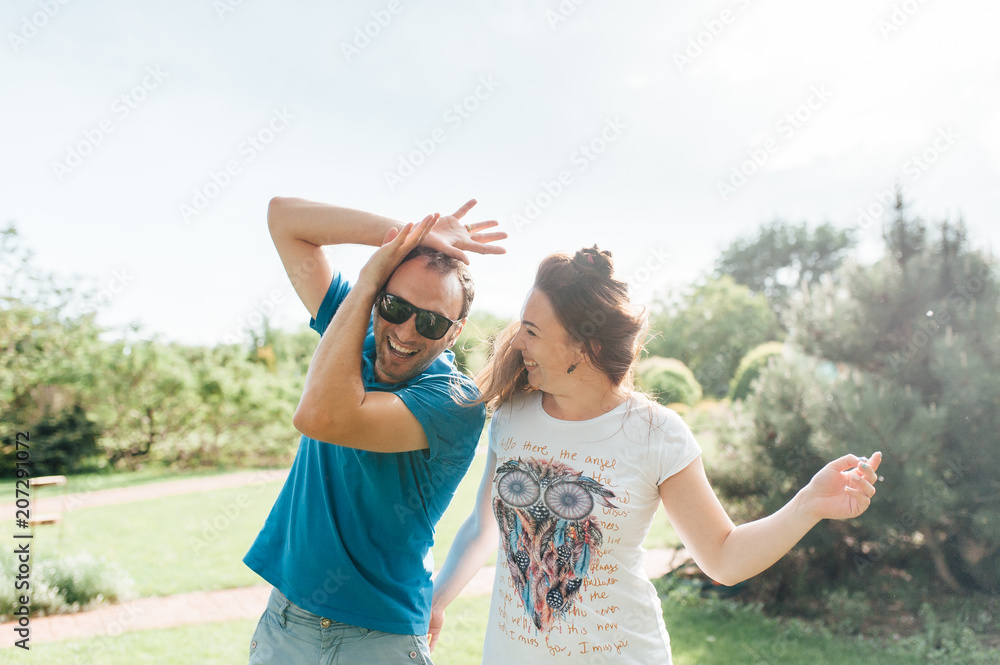 Close up funny beauty portrait of happy hipster couple Close up funny beauty portrait of happy hipster couple