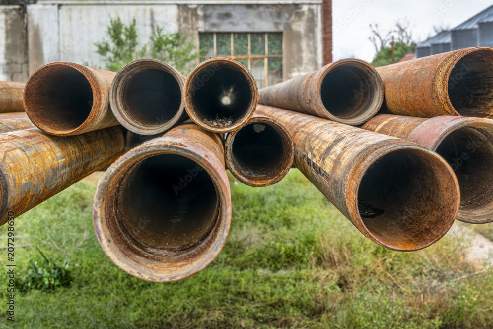 rusty pipes in workshop yard rusty pipes in workshop yard