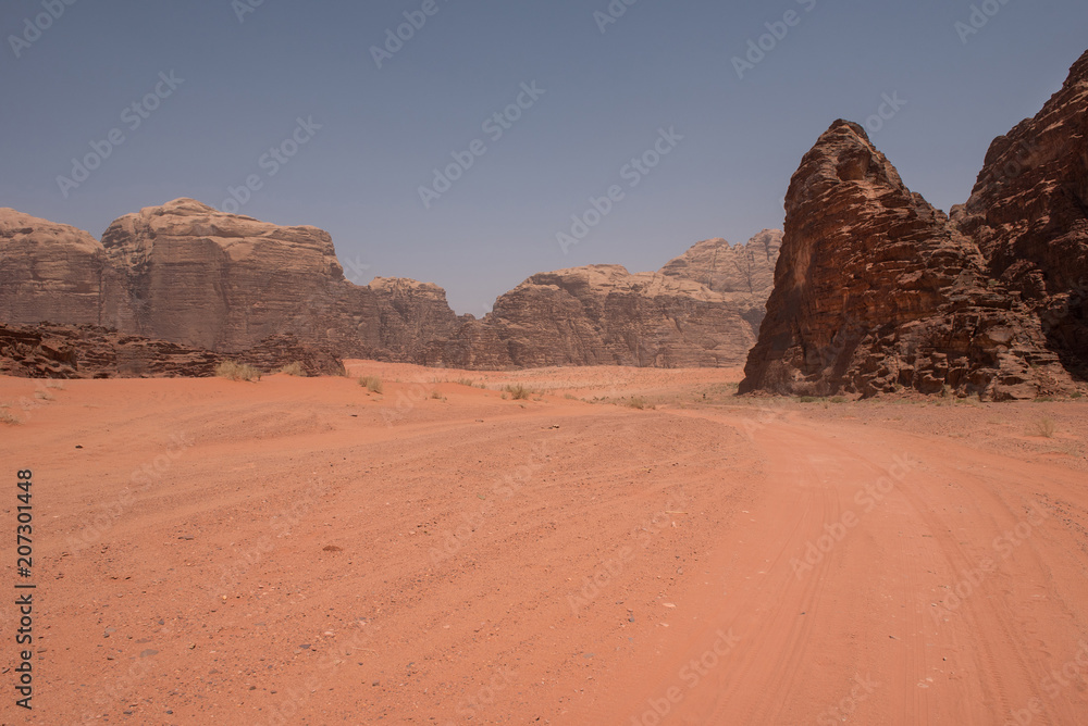 Red sand dunes and sandstone cliffs Red sand dunes and sandstone cliffs