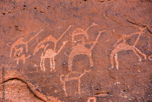 Prehistoric inscriptions in Wadi Rum, Jordan photo