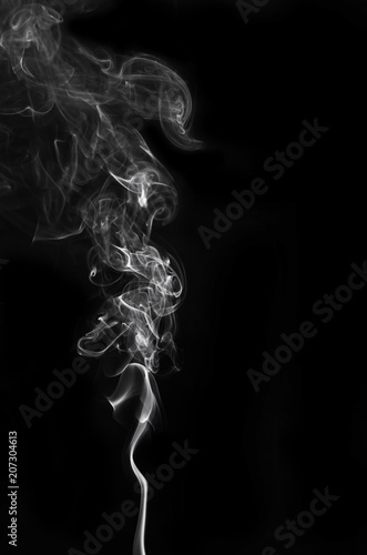 Fototapeta Naklejka Na Ścianę i Meble -  abstract fragment movement of burn white smoke on black background.