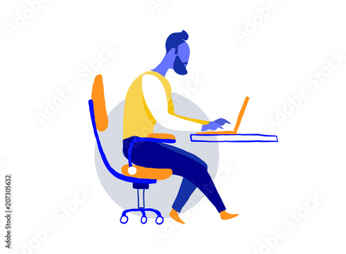 Ragazzo alla moda che lavora al computer