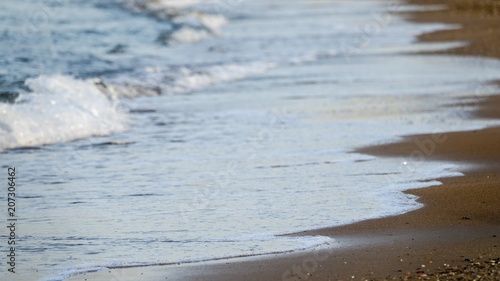 Waves that hit a beach, Cre...