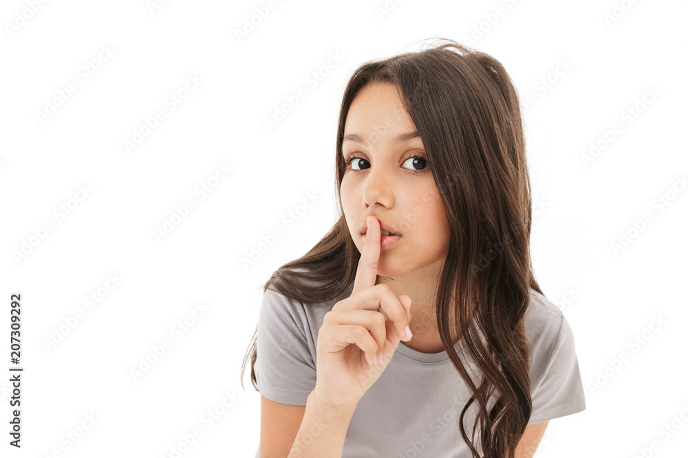 Cute girl standing isolated over white wall Cute girl standing isolated over white wall