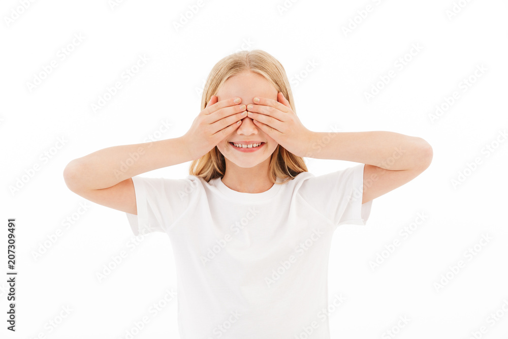 Cute girl standing isolated covering face with hands. Cute girl standing isolated covering face with hands.