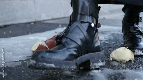 Somebody is trampling an apple