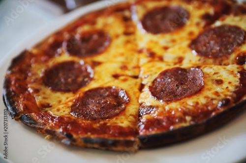 pepperoni pizza on dish   italian food