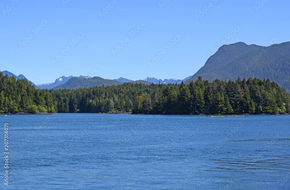 View across the bay towards islands and Mountains,, seen from Tofino, Vancouver Island British Columbia Canada View across the bay towards islands and Mountains,, seen from Tofino, Vancouver Island British Columbia Canada