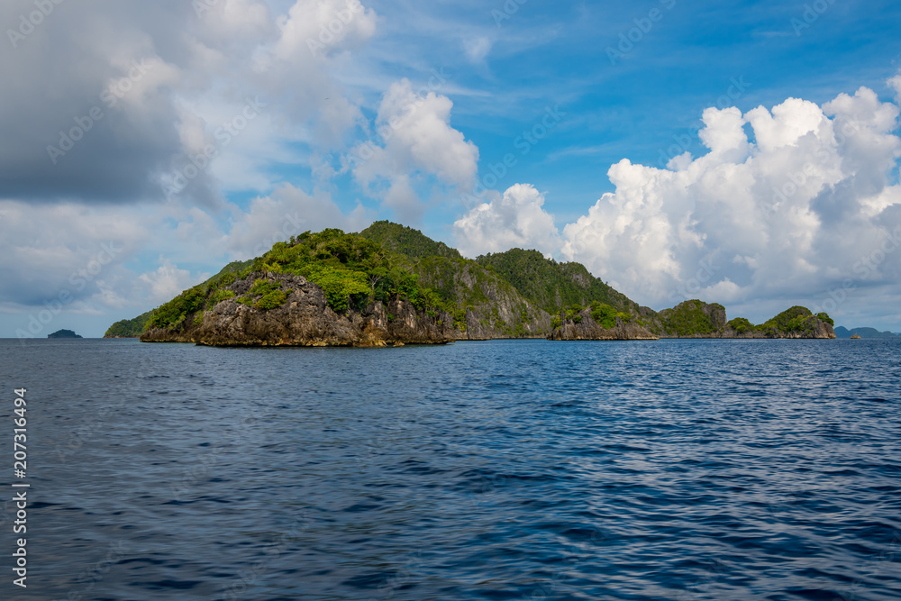 Obraz premium East Misool, group of small island in shallow blue lagoon water, Raja Ampat, West Papua, Indonesia