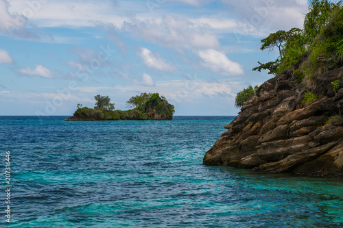 Fototapeta Naklejka Na Ścianę i Meble -  East Misool, group of small island in shallow blue lagoon water, Raja Ampat, West Papua, Indonesia