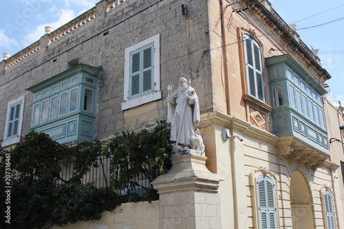 Statue of San Anton Abbati in Rabat , Malta photo