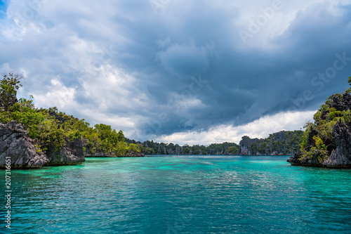 East Misool, group of small island in shallow blue lagoon water, Raja Ampat, West Papua, Indonesia