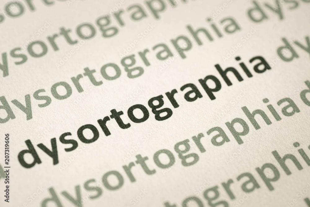 Fototapeta premium word dysortographia printed on paper macro